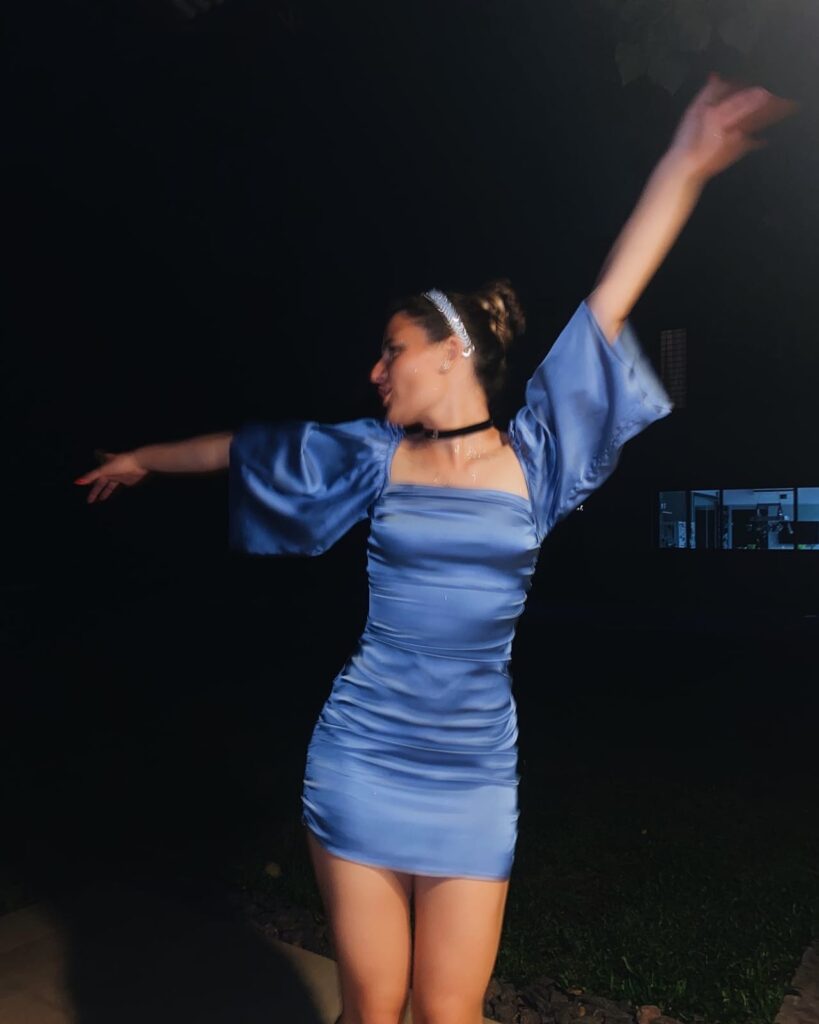 Five fashion forward Halloween costume ideas for women drawing inspiration from classic films and pop culture including Viola from She's the Man, Glinda from Wicked, Regina George from Mean Girls, Taylor Swift Reputation era, and a Harry Potter look. Fashionable and effortless costume ideas with outfits you can wear again after Halloween 2025.