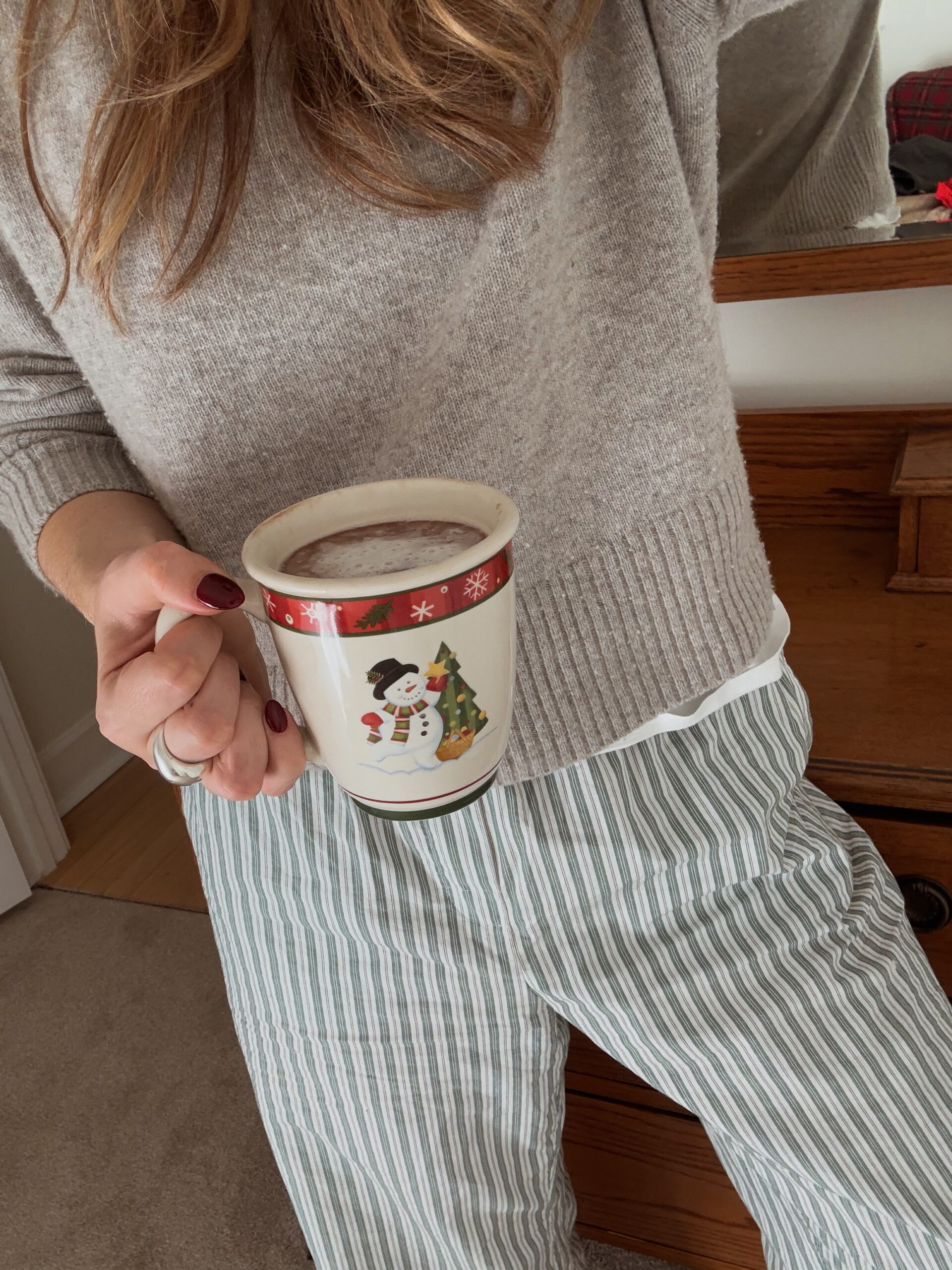 Cozy and cute Christmas sweaters styled for festive winter outfits, featuring warm knits, holiday patterns, and cheerful seasonal colors.